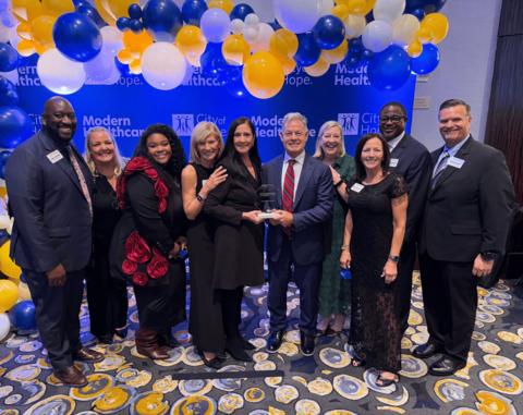 original Aramark Healthcare+ leaders, including President and CEO Paul "PJ" Johnson (center), celebrate at Modern Healthcare's "Best Places to Work in Healthcare" awards gala following the organization's recognition as the number one overall supplier organization and, for the third consecutive year, the top-ranked Large Supplier.