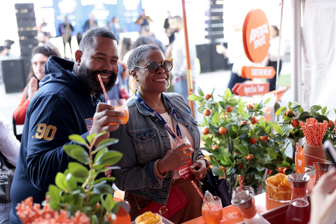 Festival guests enjoy a tasting experience at the Food Network New York City Wine & Food Festival presented by Invesco QQQ.