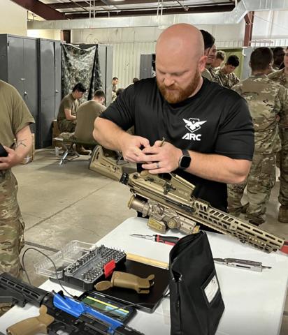 original Armaments Research Company (ARC) installs an AI-enabled weapons sensor (AEWS) during a recent Army field training exercise.