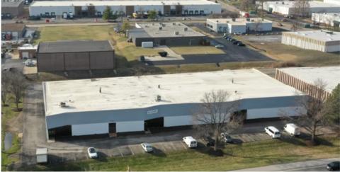 original 3726–13738 Rider Trail North; a 30,000-square-foot multi-tenant industrial building.