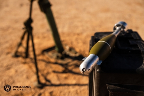 OKSI’s 81mm Precision Guidance Kit (PGK) brings its Intelligent Seeker technology to indirect fire munitions. The screw-on EO/IR system adds onboard sensing and computer vision, along with control surfaces to a standard mortar round, enabling autonomous guidance towards intended target(s) in GPS-denied and contested electronic warfare environments.
