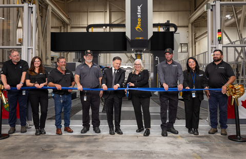 Reko International Group Inc. ribbon cutting ceremony in front of new equipment in Lakeshore Ontario. New advanced machining equipment will expand capacity for key customer product, improve productivity and support 176 jobs as Reko invests for its next chapter.