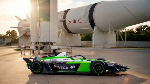 The Paysafe Envision Racing Formula E Team car, with photos captured in front of the space complex in Cape Canaveral, Florida