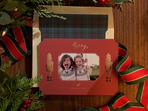 Minted’s 2026 holiday collection brings renewed energy to nostalgic Christmas motifs, including classic nutcrackers paired with rich red and gold foil details. Shown here is Golden Nutcrackers by Anne Ciotola. Shop the full collection at minted.com/holiday. Courtesy of Minted.