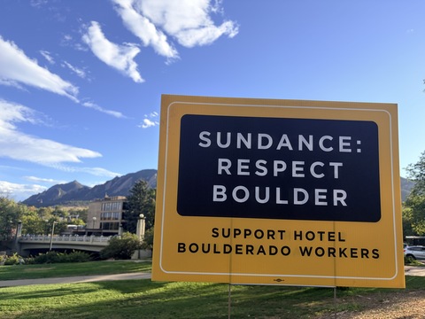 A lawn sign calling on Sundance to respect Boulder and support workers at the Hotel Boulderado, its film festival headquarters for January 2027. Photo by UNITE HERE.
