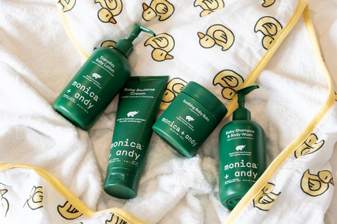 Photo of Monica + Andy Baby Care Line Products: Everyday Baby Lotion, Baby Bedtime Cream, Soothing Baby Balm, and Baby Shampoo & Body Wash (from left to right)