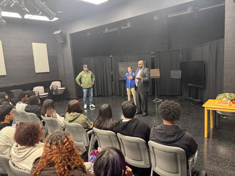 original Pablo Colón (right), Director of Corporate Citizenship and Executive Director of the Avangrid Foundation, and Moses Rams (left), Chief Line Officer for United Illuminating, speaking to attendees at recent Bridgeport Caribe Youth Leaders event.