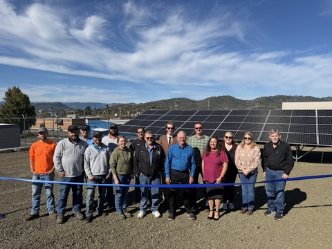 original Representatives from Ameresco, RUSA, and project stakeholders commemorate the successful completion of the project during a ribbon-cutting ceremony, celebrating a milestone that will deliver lasting benefits to the community.