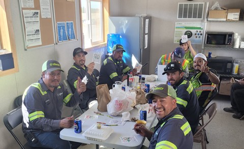 Liberty employees write notes for student donations in Prineville, Oregon, as part of the Blessings in a Backpack giving campaign.