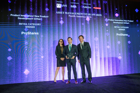 Sean Grover (center), Director of Product Development at ProShares, accepts the Product Innovation Award for the ProShares GENIUS Money Market ETF (IQMM).