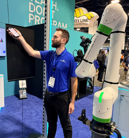 thumbnail Hirebotics sales director Dan Adams points the iPhone where he wants the cobot to start painting, clicks and then moves to the next position, making teaching faster and easier, especially for areas that are difficult to access when manually manipulating the cobot arm.