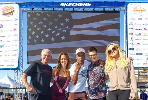 David Weinberg, Brooke Burke, Sugar Ray Leonard, actor Nate Simon, and Robin Curren celebrate the 2026 Skechers Pier to Pier Friendship Walk.