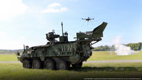 original A Stryker Nuclear, Biological and Chemical Reconnaissance Vehicle (NBCRV) Sensor Suite Upgrade (SSU) and a dismounted CBRN Unmanned Aircraft System (UAS). Photo Credit: DVIDS. The appearance of U.S. Department of War (DoW) visual information does not imply or constitute DoW endorsement.