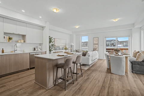 original The open-concept kitchen and living area in a MPV Parkfield Towns model home showcases the spacious, family-oriented design found throughout the community’s three- and four-bedroom rental townhomes, offering modern finishes and comfortable living spaces for everyday life and entertaining.