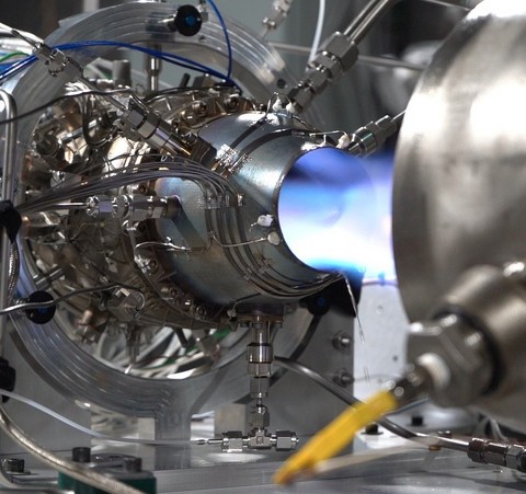 thumbnail Beehive Industries’ 100-lbf. Frenzy 6 engine prototype, or Zero Engine to Test (ZETT), fires in the test cell at one of the company’s Colorado testing facilities in September 2026. [Photo Credit: Beehive Industries]